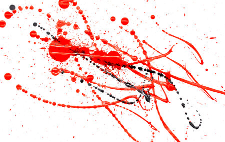 Black and red drops of paint on a white background. Abstraction