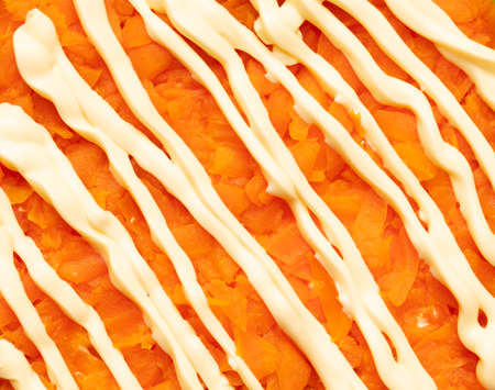 Mayonnaise on boiled carrots in a salad. backgroundの写真素材