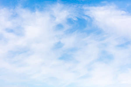 White clouds on a blue sky as abstract background.