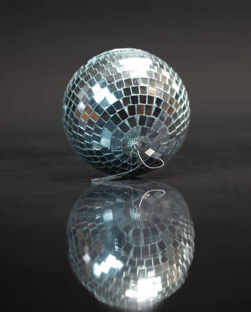 Mirror ball on a black background.の写真素材
