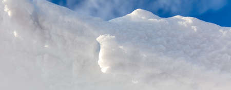 White snow against the blue sky. nature in winter