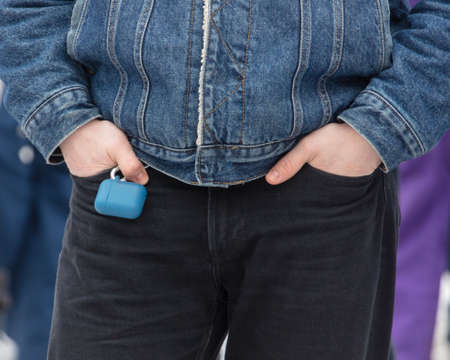 Hands in the pockets of a man's jeans.の写真素材