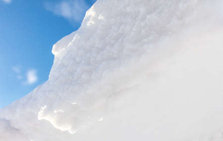 White snow against the blue sky. nature in winterの写真素材