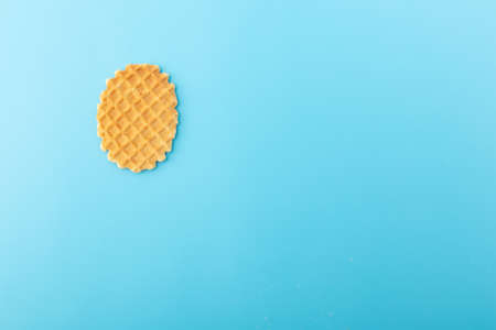 Sweet cookies isolated on blue background.の写真素材
