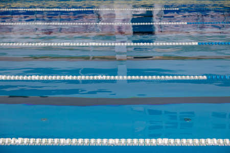 Sports pool with blue water in the hall.