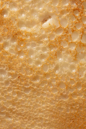 Pan fried pancake as a background. close-up