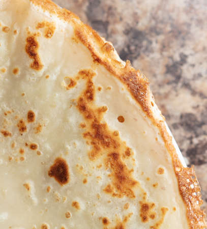 Pan fried pancake as a background. close-upの写真素材