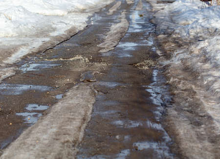 Snow on the road in winter. backgroundの写真素材