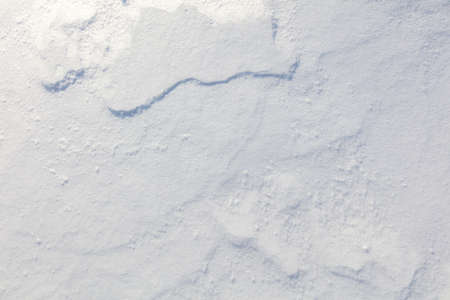 Snowy crust as an abstract background. textureの写真素材