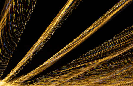 Festive lights in motion as an abstract background. Texture