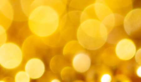 Golden bokeh as an abstract background. textureの写真素材