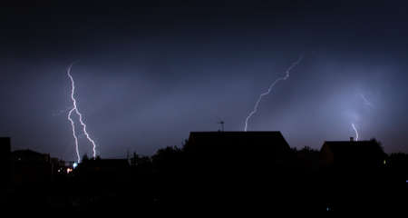 Lightning struck the house as an abstract background.の写真素材