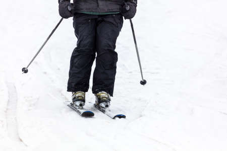 The skier is riding in the snow. Winterの写真素材