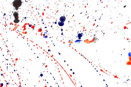 Drops of red and blue paint on a white background. Abstraction