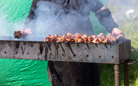 Meat on skewers grilled on coals. foodの写真素材