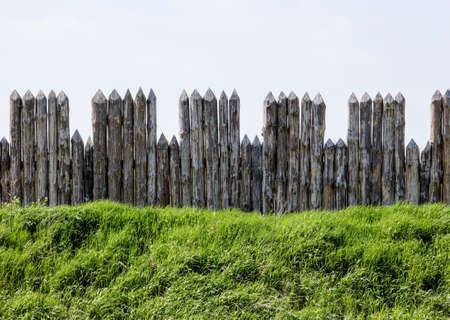 Wooden fence against the sky. backgroundの写真素材