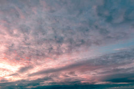 Clouds in the sky at sunset. backgroundの写真素材