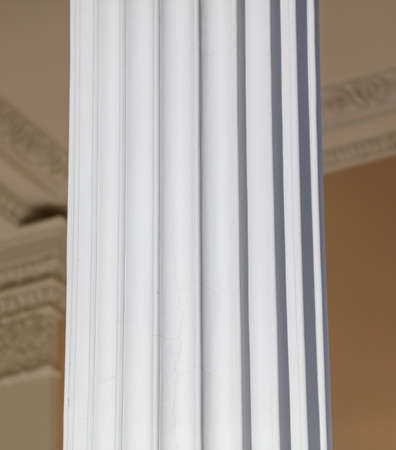 Old concrete column of the building as a background. architecture