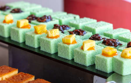 Cakes and pastries on the shelves in the market. close-up