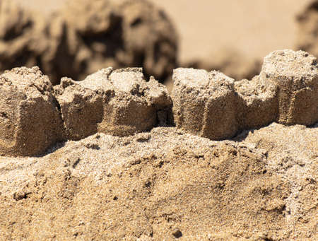 Sand towers on the seashore.