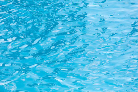 Blue water in the pool. background