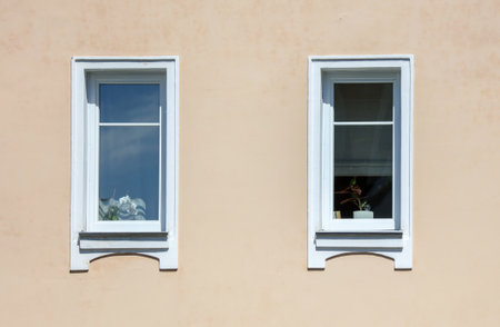 Windows on the wall of an old high-rise building. backgroundの写真素材