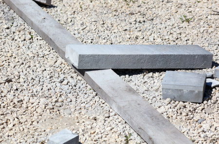 Concrete curb lie at the construction site.の写真素材