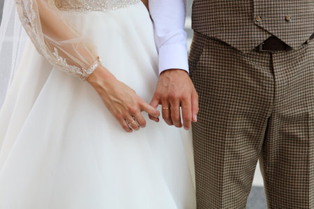 The bride and groom with golden rings on their hands. wedding close up