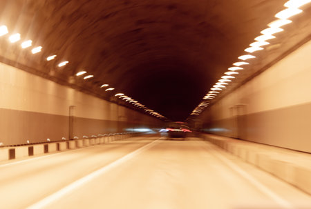Car in the tunnel in motion. background