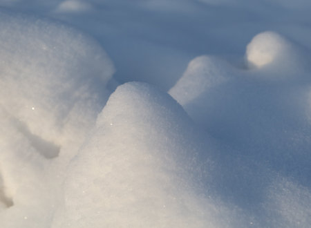 White fluffy snow on the ground as a background. Winterの写真素材