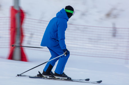 A man is skiing in the snow. Winterの写真素材