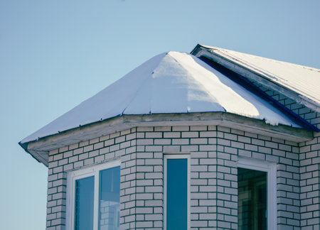Roof of the house with snow. Winterの写真素材