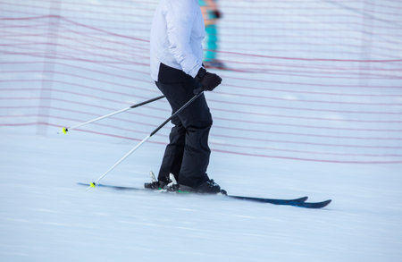 A man is skiing in the snow. Winterの写真素材