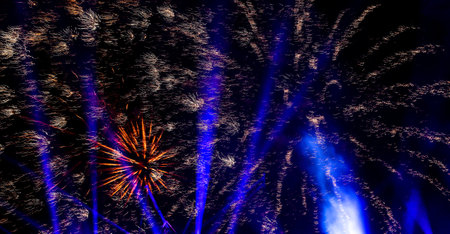 Fireworks at night as background. Festive texture