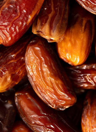 Juicy dried dates as background. close-up