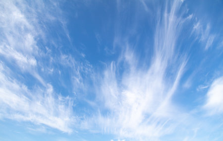 White clouds on the blue sky as a background.の写真素材