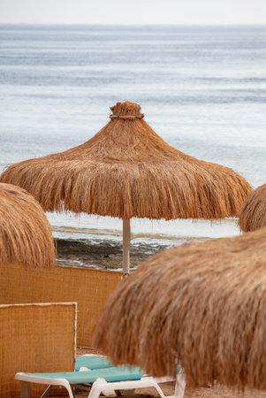 Straw sun lounger on the beach. relaxationの写真素材