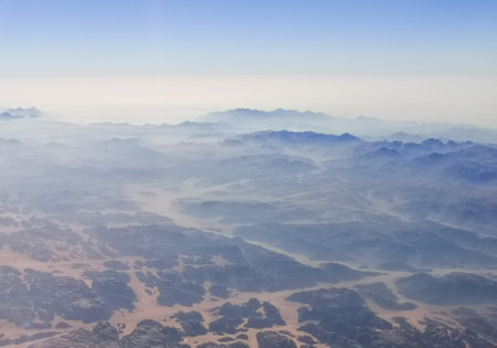 Dry mountainous land as background. View from the airplane window.の写真素材