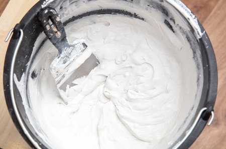 Tool for plastering a bucket with a mixtureの写真素材