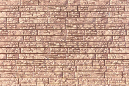 Wall of brick siding as an abstract background. texture.