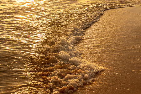 Sandy shore on the sea at sunset as a background. Natureの写真素材