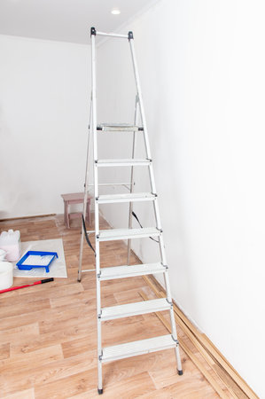 Ladder ladder in the room under renovation.の写真素材