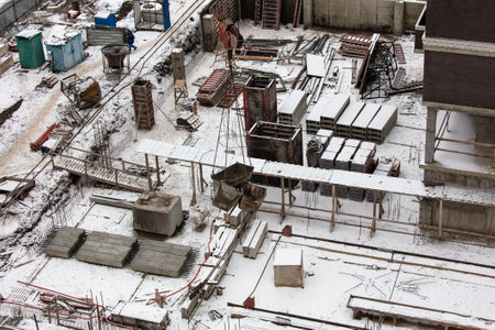 Concrete blocks for the foundation in the snow in winter at a construction site.の写真素材