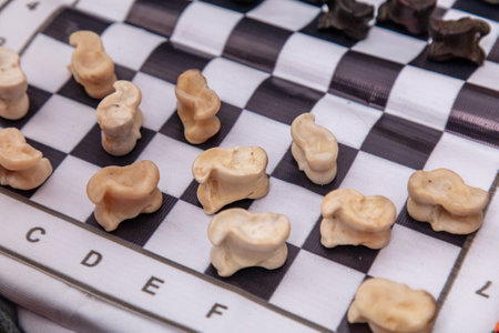 Chess game with white and black dice on a chessboard