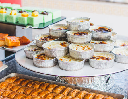 Cakes and pastries on the shelves in the market. close-up
