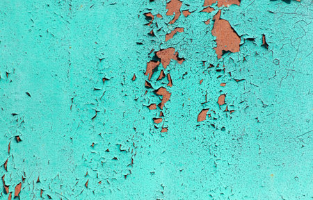 Old peeling paint on blue metal. Abstract background for design.の写真素材