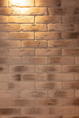 Brick background with lighting. abstract texture.