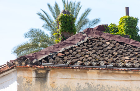 Old tiles on the roof of the house.の写真素材
