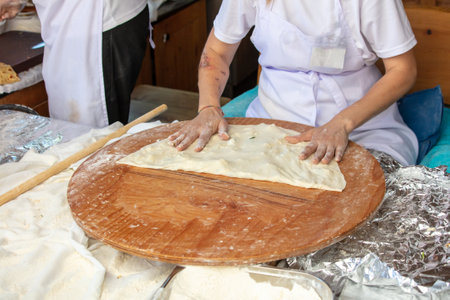 Cooking gozleme in the kitchen. National dish of Turkey.の写真素材