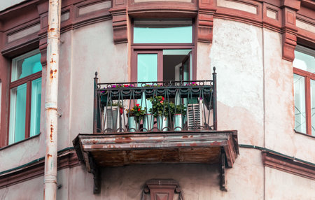 Old balcony on the wall of a vintage building.の写真素材
